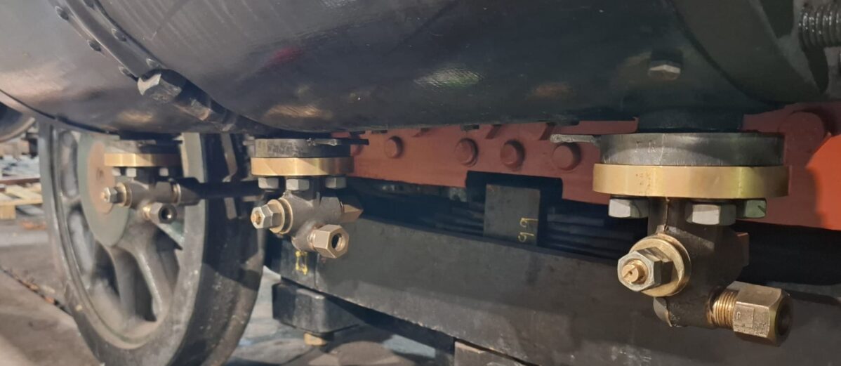 Fireman's side cylinder drain cocks.